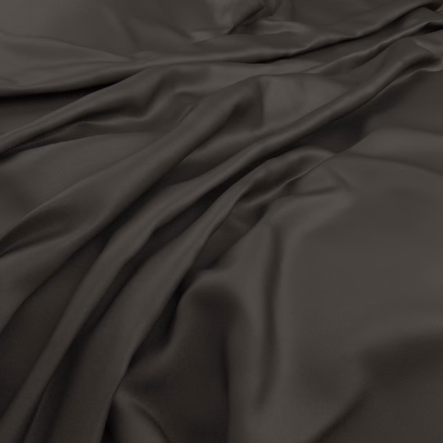 Deep ash-grey Serena fabric gathered in fluid folds with a soft sheen