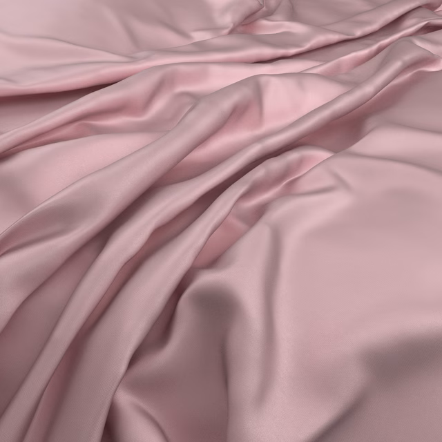 Dusty candy-pink Serena fabric with mauve shadows in softly lustrous folds