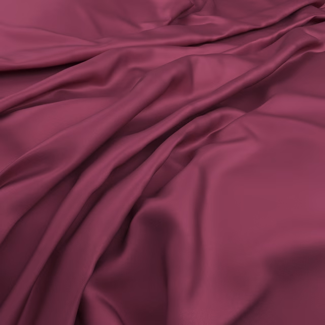 Deep berry-red Serena fabric falling in glossy, fluid folds with plum-toned shadows