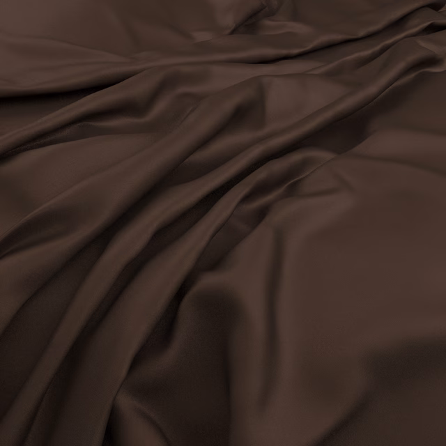 Deep cocoa-brown cloth gathered into glossy, fluid folds with shadowed troughs