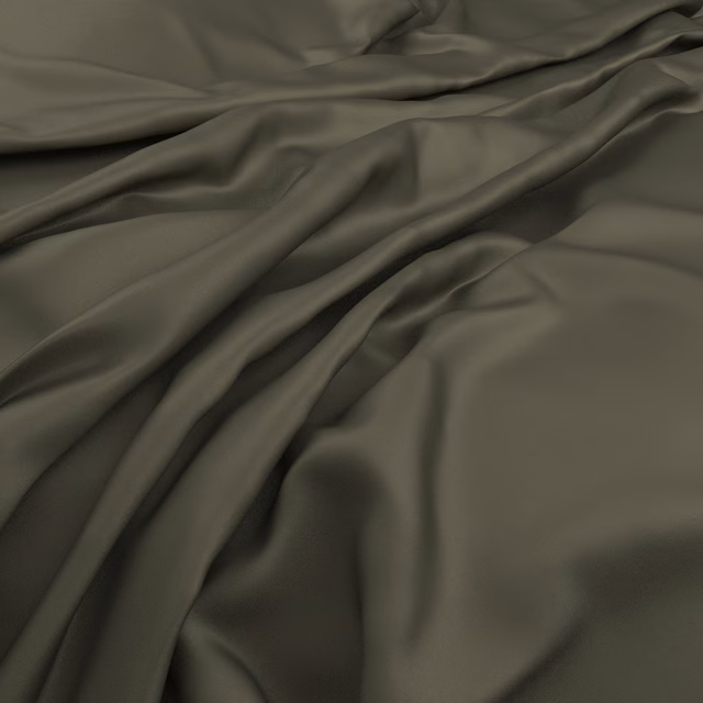Deep conifer-green cloth in fluid folds with a muted satin sheen