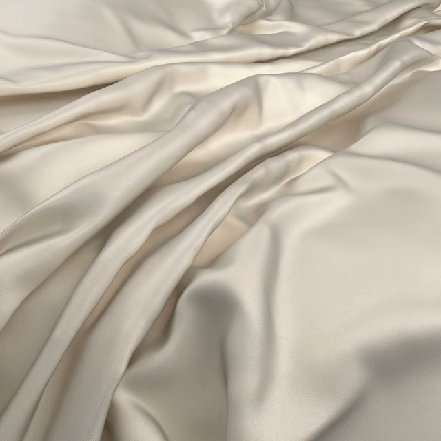 Ivory cream Serena fabric with fluid folds and a soft lustrous sheen