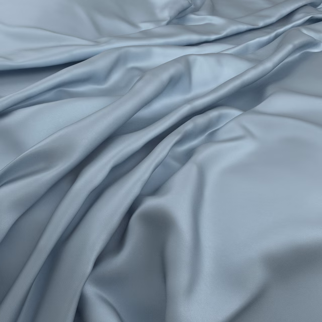 Pale icy blue-grey fabric falling in smooth, softly lustrous fluid folds