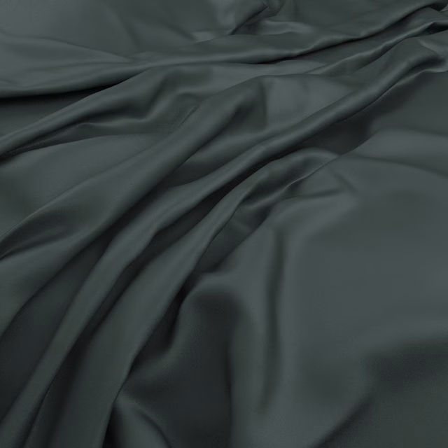 Deep juniper-green cloth draped in soft folds with a subtle sheen