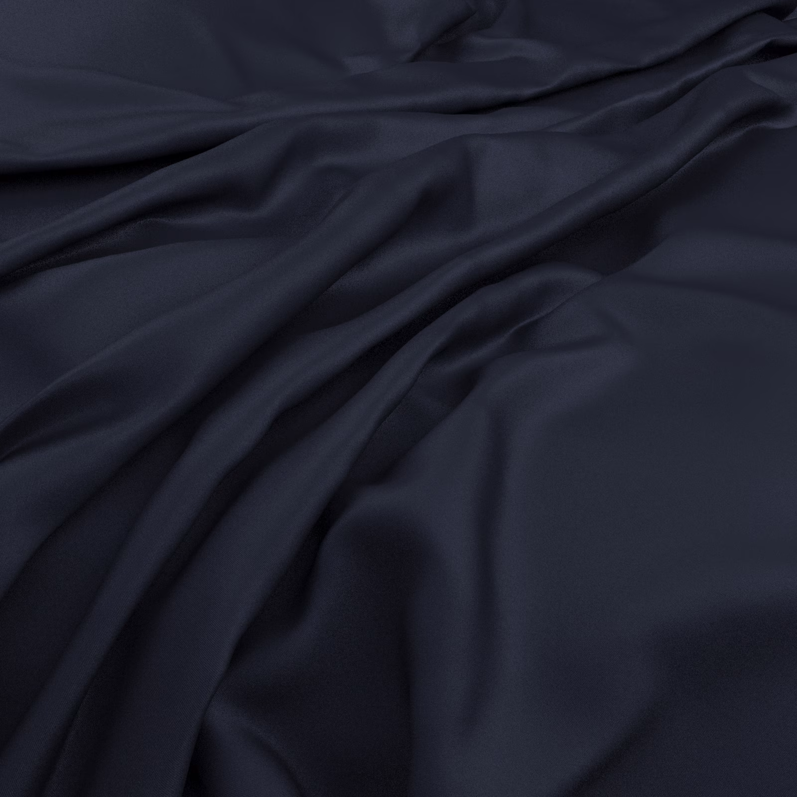 Deep midnight-blue fabric falling in smooth, softly lustrous folds