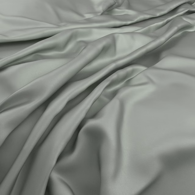 Pale seafoam green Serena fabric with smooth satin-like sheen in flowing folds