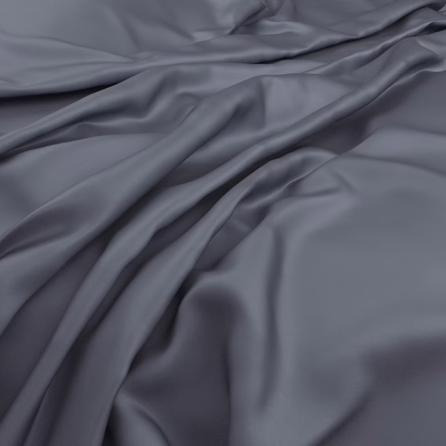 Fluid slate blue-grey fabric in softly gathered folds with subtle satin-like highlights