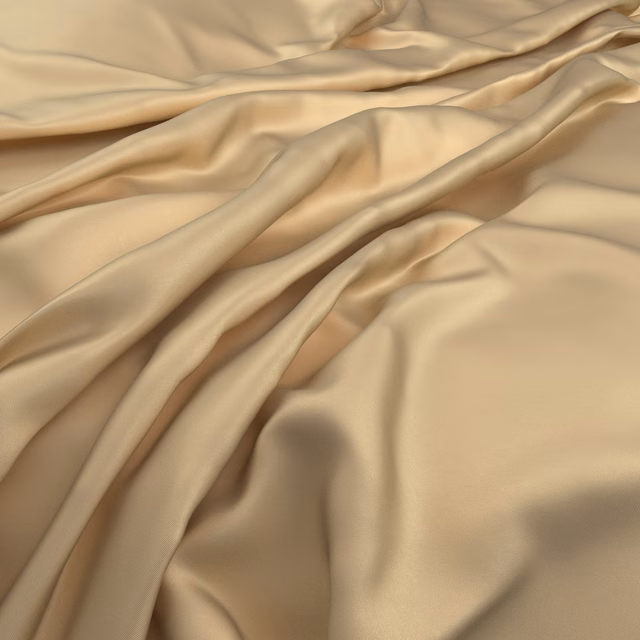 Warm syrup-beige fabric with smooth lustre cascading in fluid folds