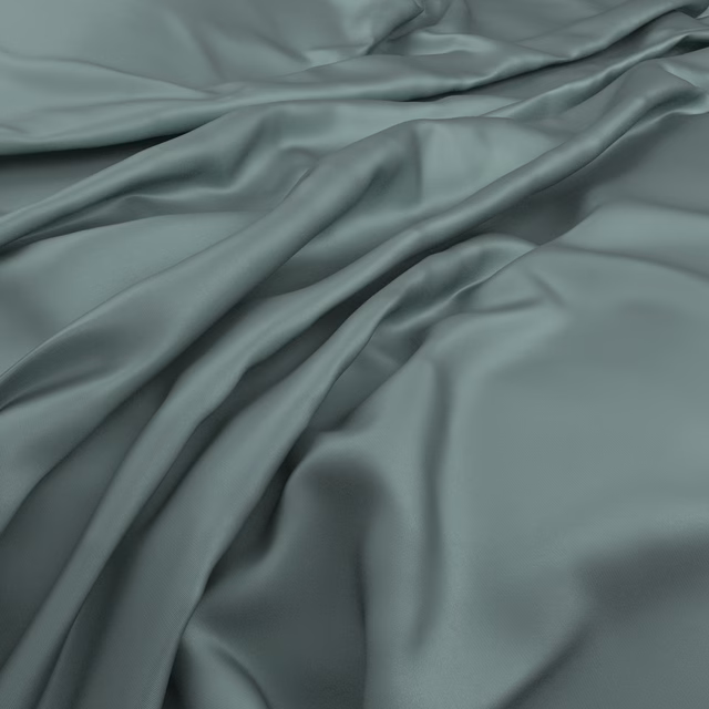 Smooth muted Tiffany teal fabric falling in glossy, fluid folds