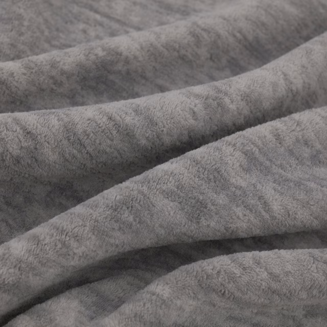 Cool mid-grey Sherpa fabric with plush brushed pile folded into softly shaded ridges