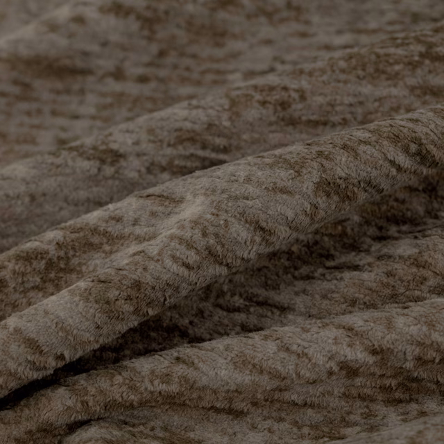 Warm chestnut-brown nubby pile shown in softly ridged fabric folds