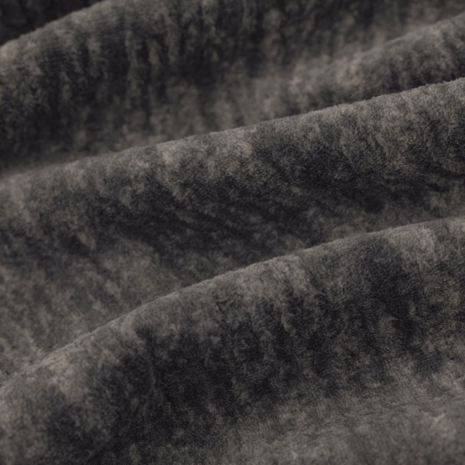 Dark charcoal Sherpa fabric with plush pile and blurred tonal shading across folds