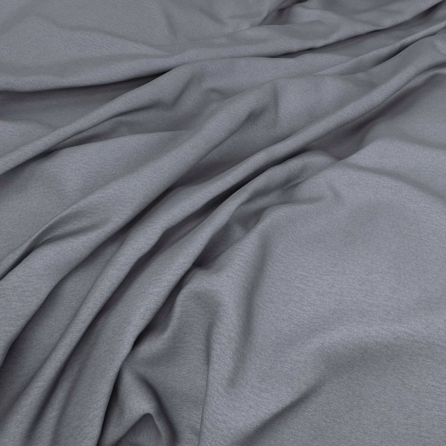 Cool cement-grey fabric with fine texture arranged in softly flowing, light-catching folds
