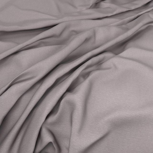 Smooth pebble-grey taupe textile arranged in flowing folds with a subtle sheen