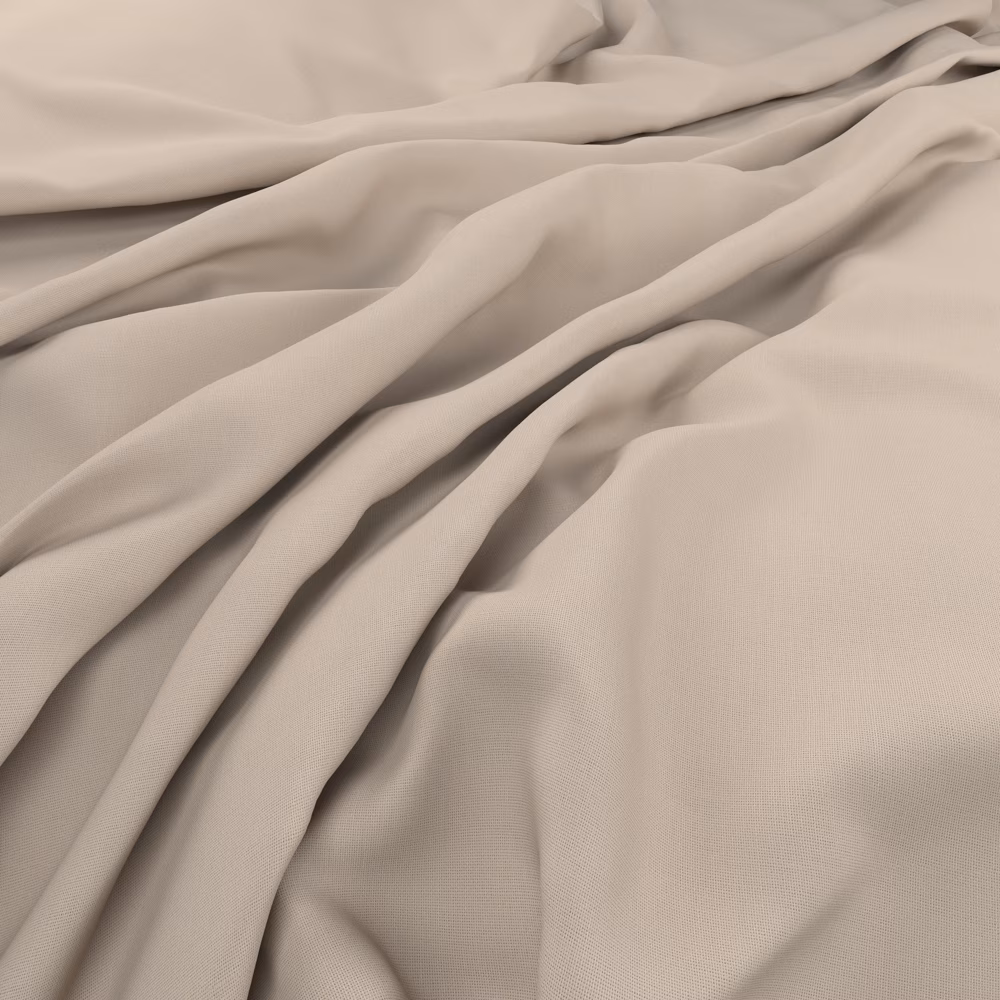 Warm coconut-cream fabric close-up showing fine weave and soft fluid folds