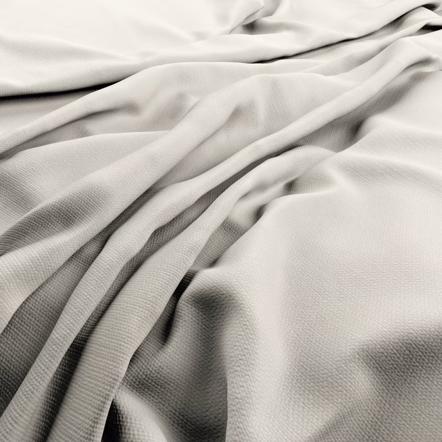 Soft bone ivory fabric with fine woven texture gathered into flowing folds