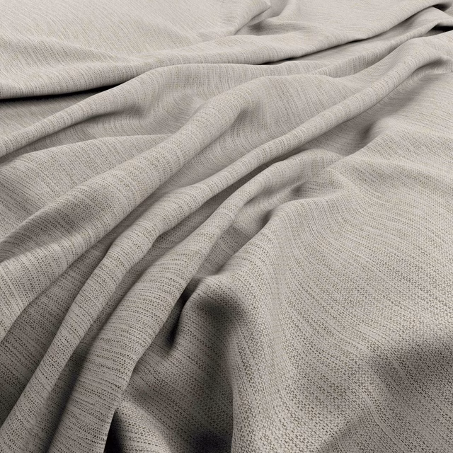 Pale greige woven fabric draped in soft folds with fine rippled texture