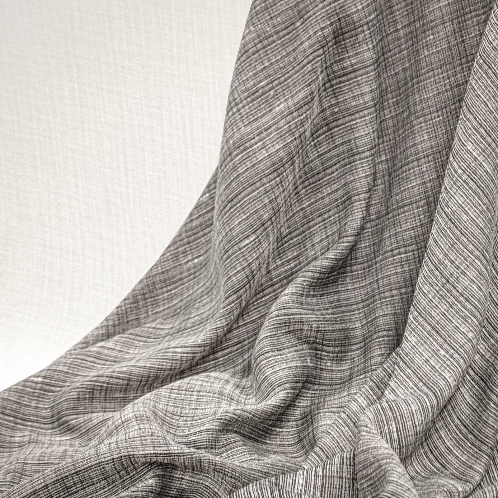 Cool silver-grey woven cloth with fine linear texture and softly gathered folds