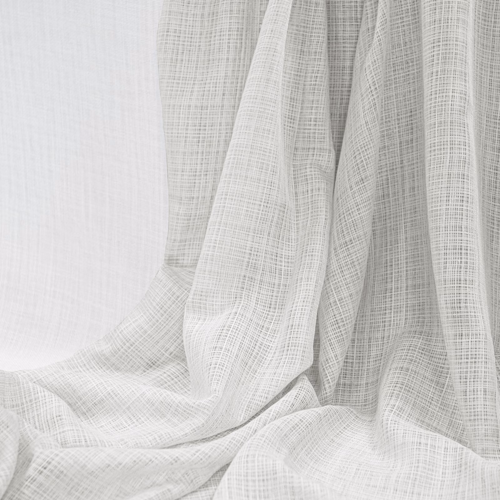 Skiathos White sheer fabric with fine crosshatch weave in gathered folds