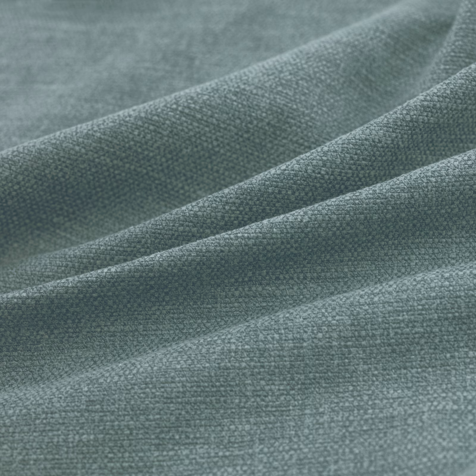 Muted kingfisher teal woven textile shown in soft folds with a fine grain