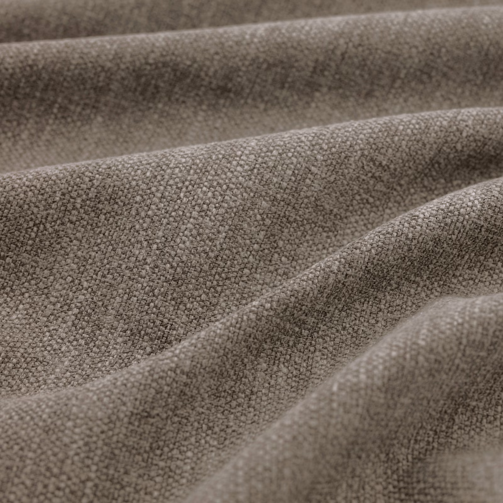 Muted taupe-grey Slite fabric showing a fine pebbled weave in soft folded ridges
