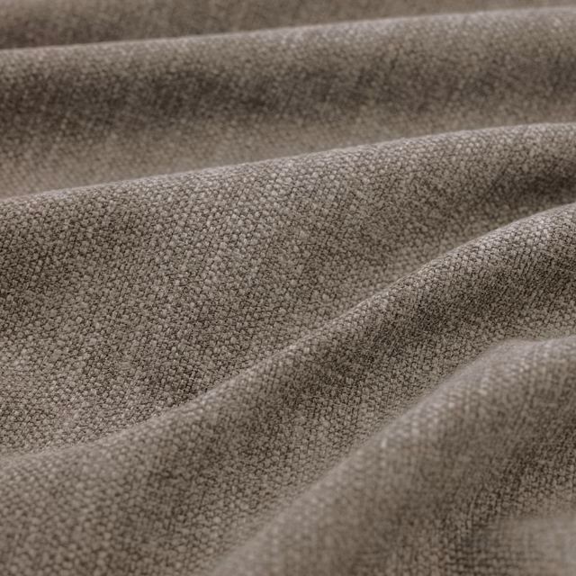 Muted taupe-grey Slite fabric showing a fine pebbled weave in soft folded ridges