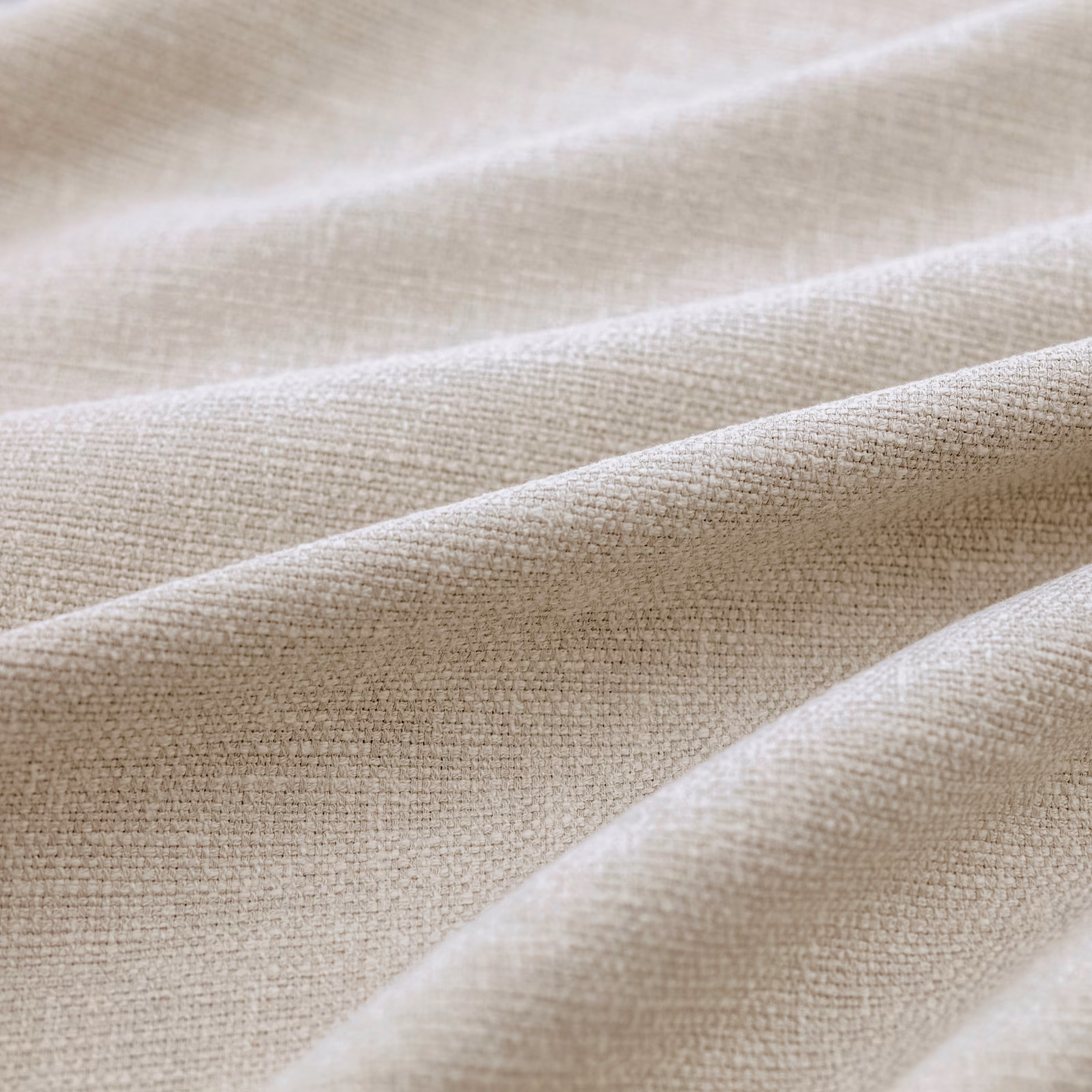 Warm taupe-beige Slite Pebble with fine crosshatch weave in folded swatch