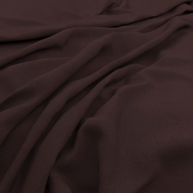 Dark aubergine fabric with fine slub texture gathered into soft diagonal folds