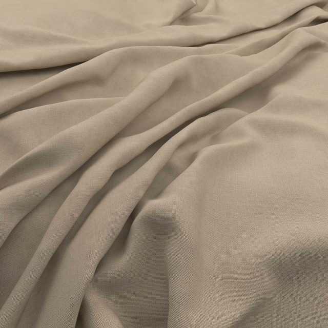 Warm chino beige fabric with fine weave, soft folds and subtle slub texture