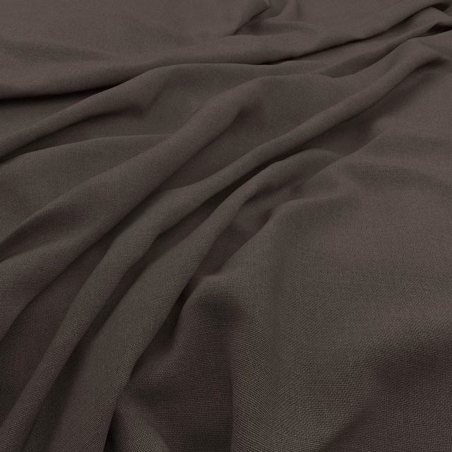 Deep earthy taupe woven fabric with fine slubs gathered into softly shadowed folds