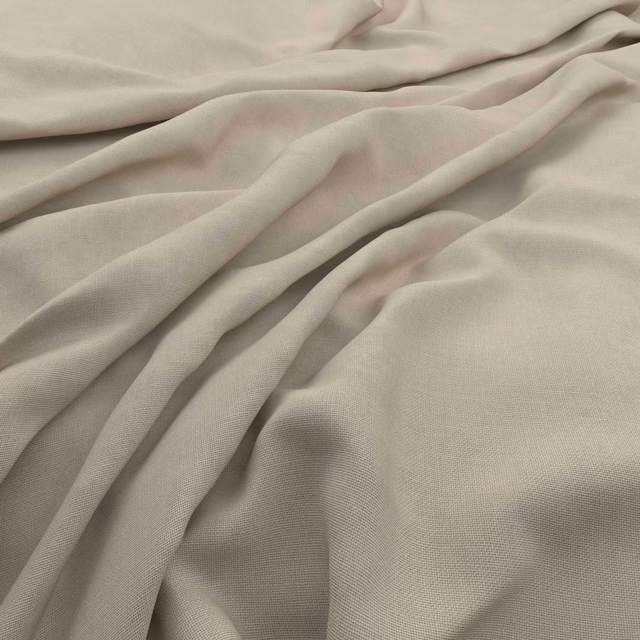 Pale flax-beige textile with fine weave and softly pooled draped folds