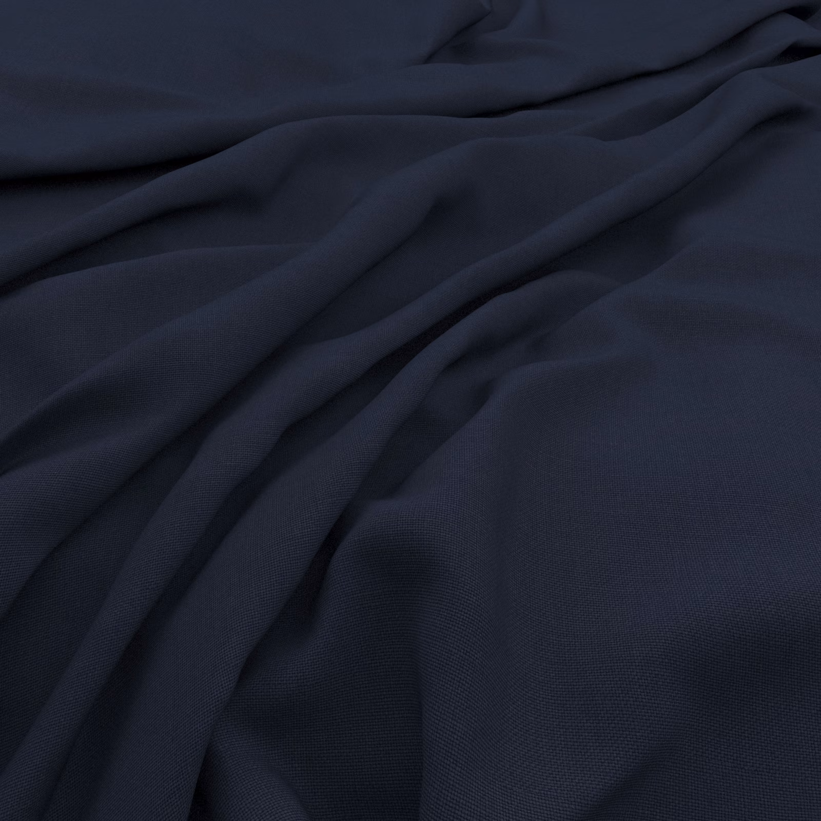 Deep indigo textile with fine slubby weave and softly gathered matte folds