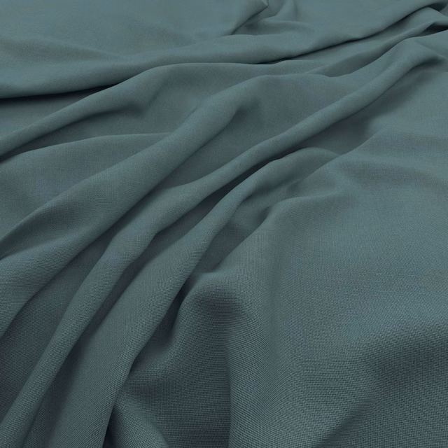 Muted lagoon teal plain weave with fine slubs and soft draped folds