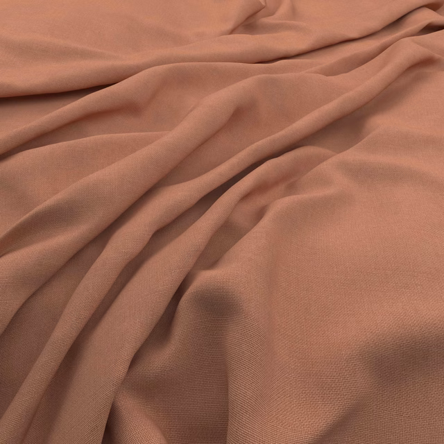 Dusty old-rose cloth with a fine slubby weave gathered into soft folds