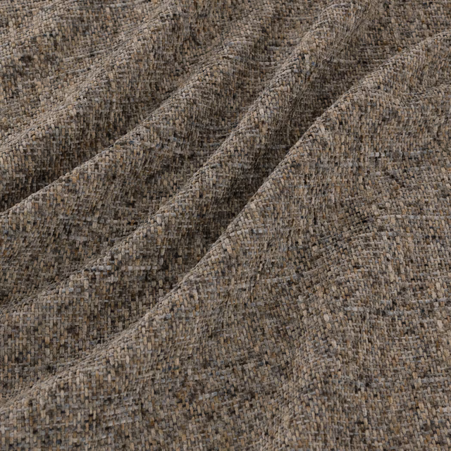 Close-up of Soho Fossil's mottled taupe-brown chunky woven textile with raised tonal threads