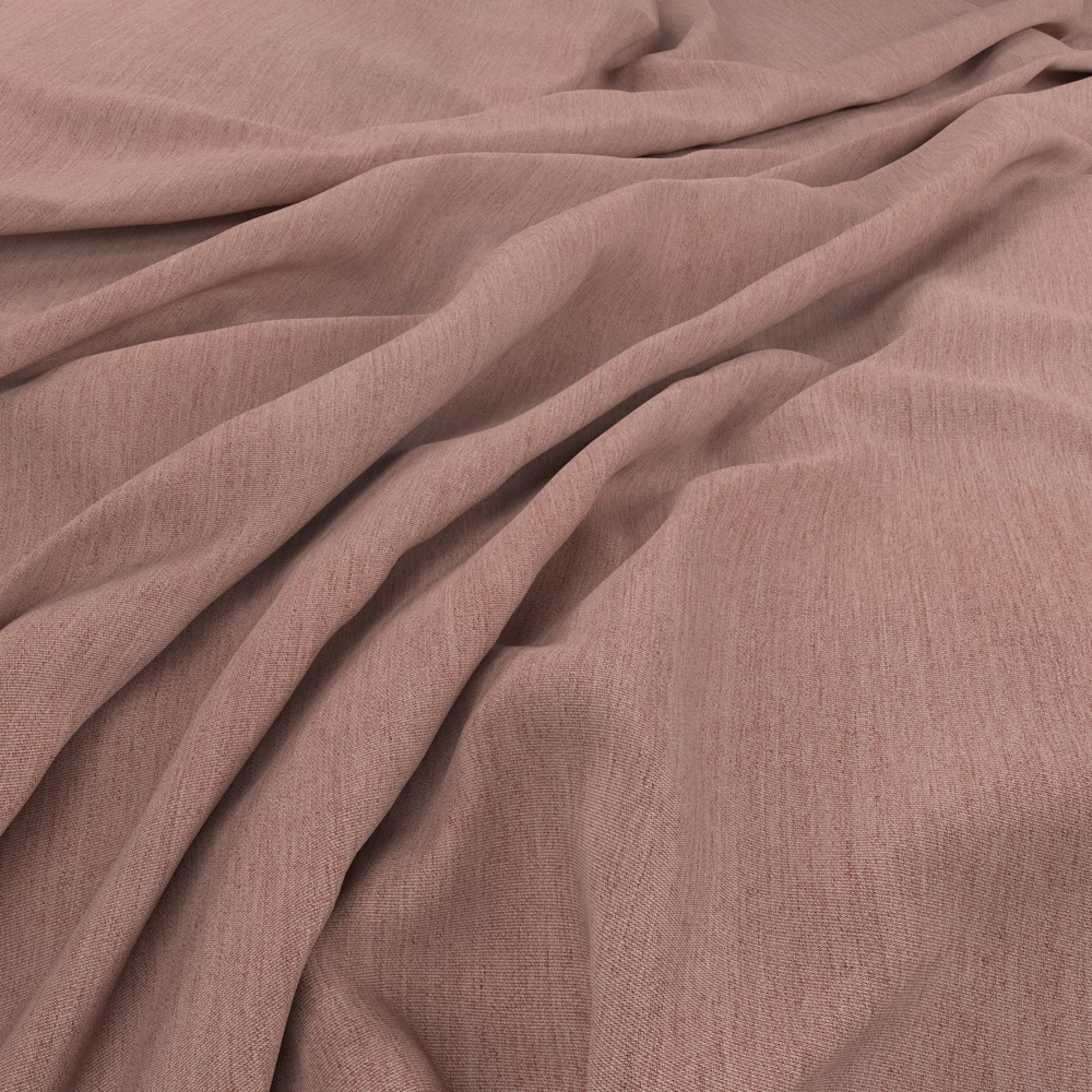 Dusty rose fabric with softly irregular weave falling into fluid folds