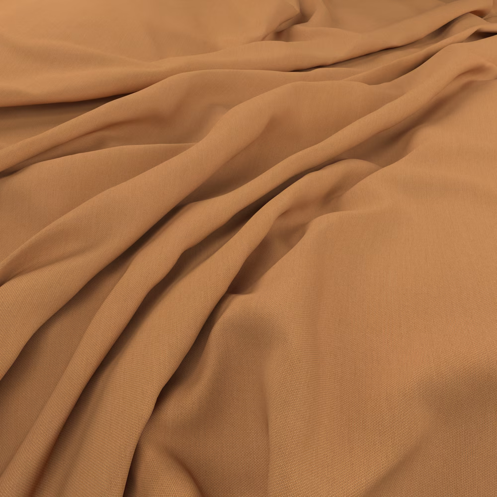 Warm desert-caramel plain-weave fabric gathered into soft, flowing folds