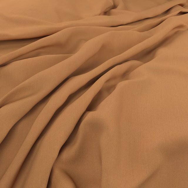 Warm desert-caramel plain-weave fabric gathered into soft, flowing folds