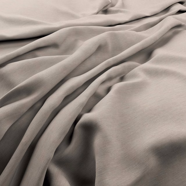 Driftwood taupe-grey fabric falling in soft folds with a fine, subtle weave