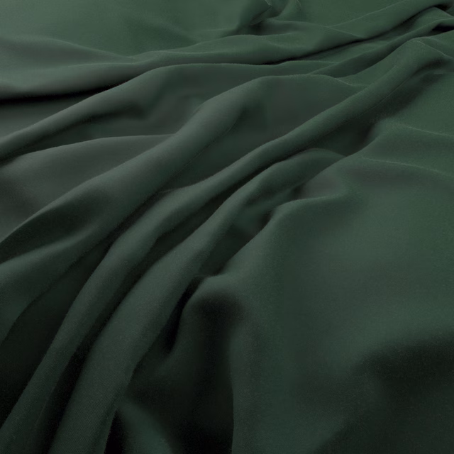 Deep evergreen cloth with smooth fluid folds and a subtle soft sheen