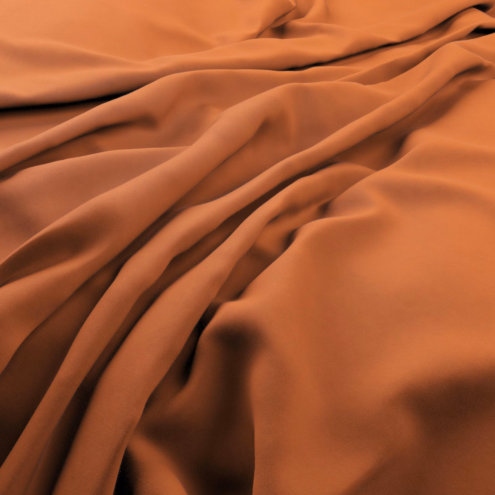 Warm mandarin-orange cloth with smooth sheen, gathered into deep fluid folds