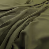 Deep moss-olive cloth falling in soft folds with a subtle sheen