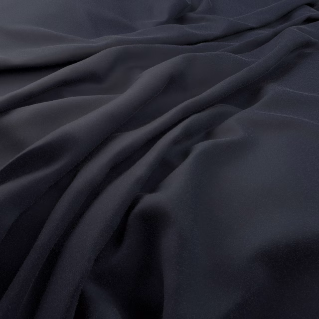 Deep navy plain fabric draped in fluid folds with subtle low-sheen highlights