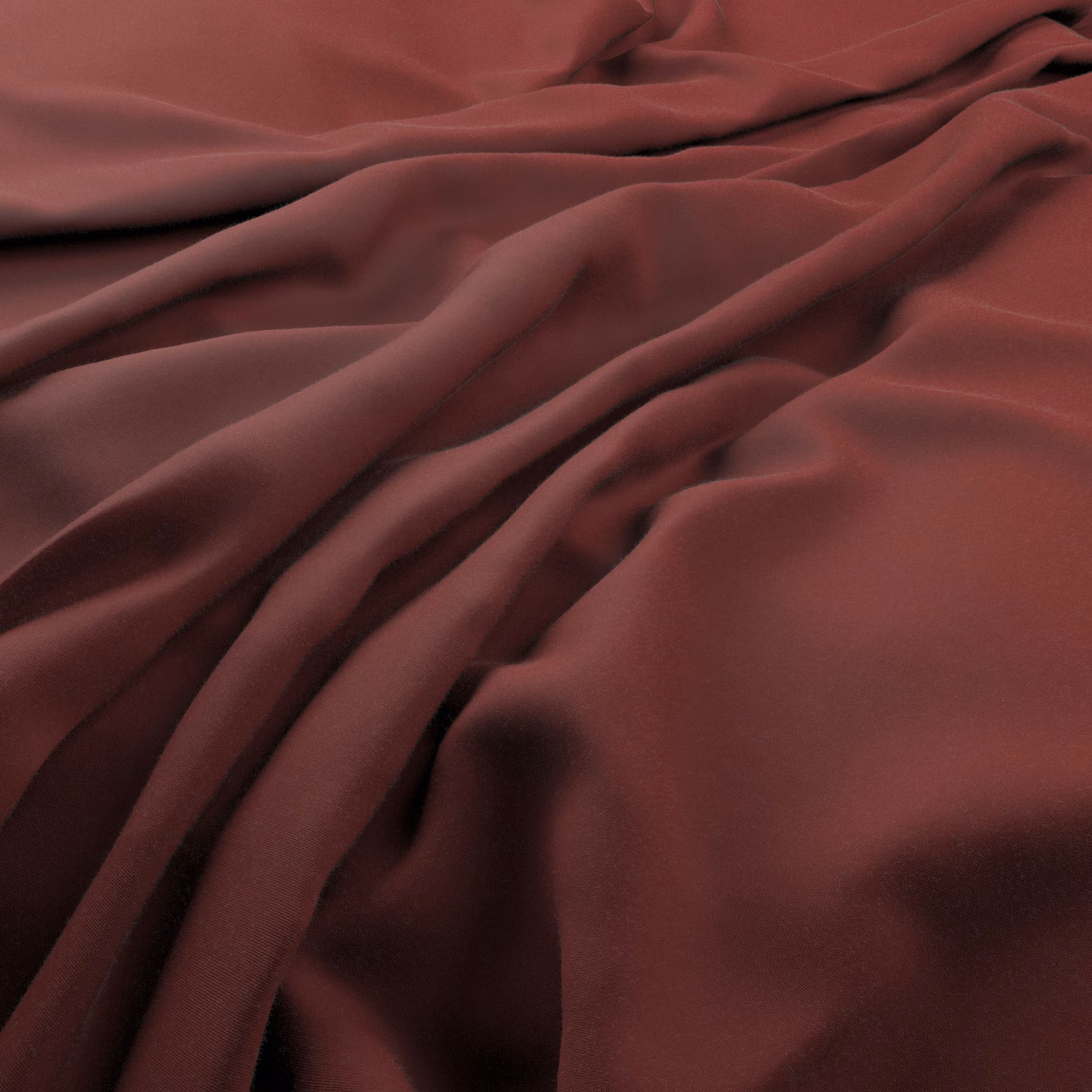 Deep berry-red fabric gathered into smooth, softly lustrous flowing folds