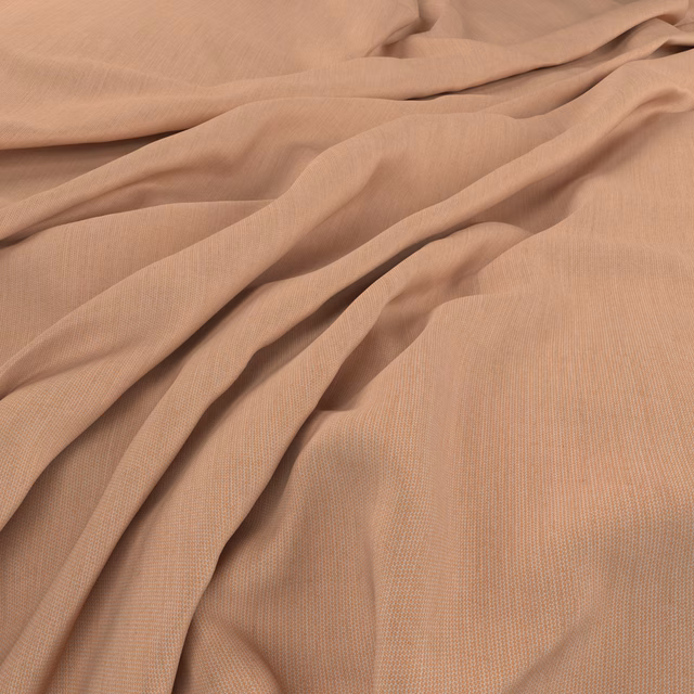 Draped fine plain-weave fabric in a warm muted salmon-peach shade