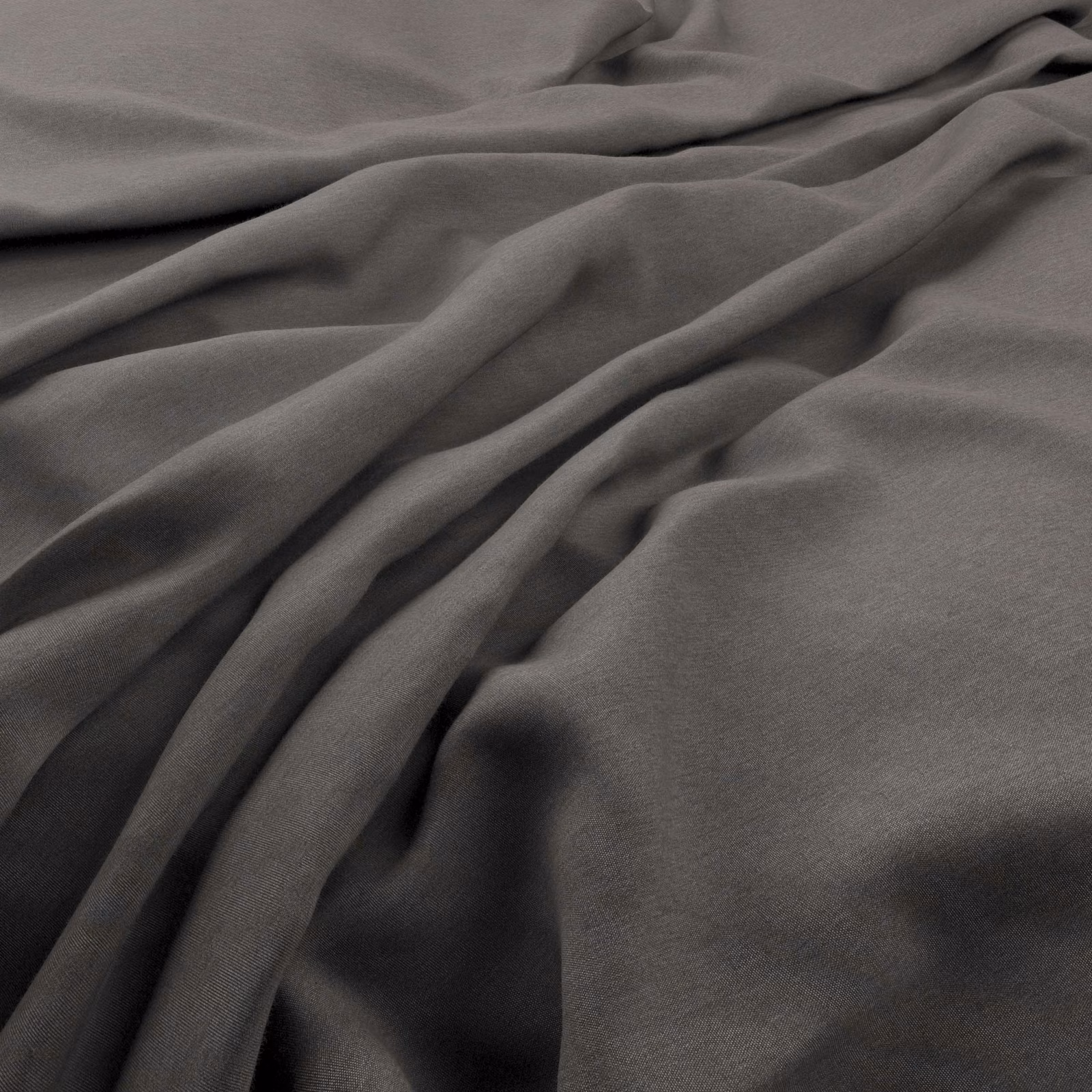 Soft charcoal grey plain fabric draped in fluid folds with a subtle surface lustre