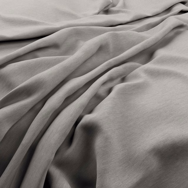 Fluid folds of cool shark-grey fabric showing a fine, softly textured plain weave