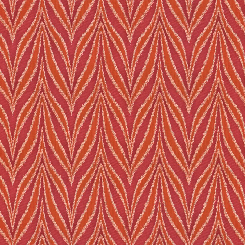 Warm coral-red woven textile with cream and blush geometric chevrons