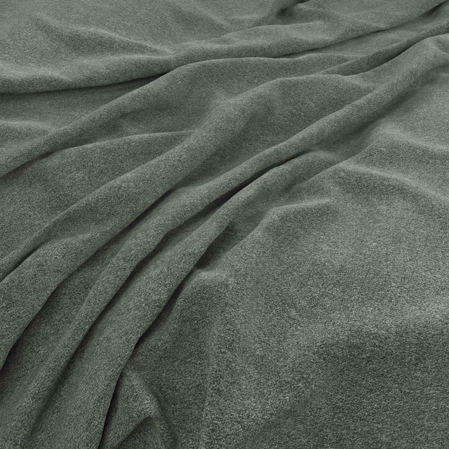 Deep pine-green cloth with a soft brushed texture, gathered into flowing folds