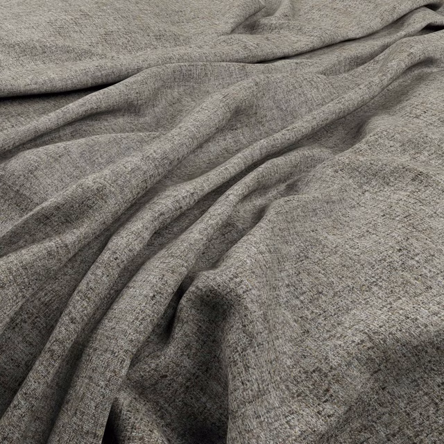 Mottled platinum-grey woven fabric gathered into deep, fluid folds with charcoal shading